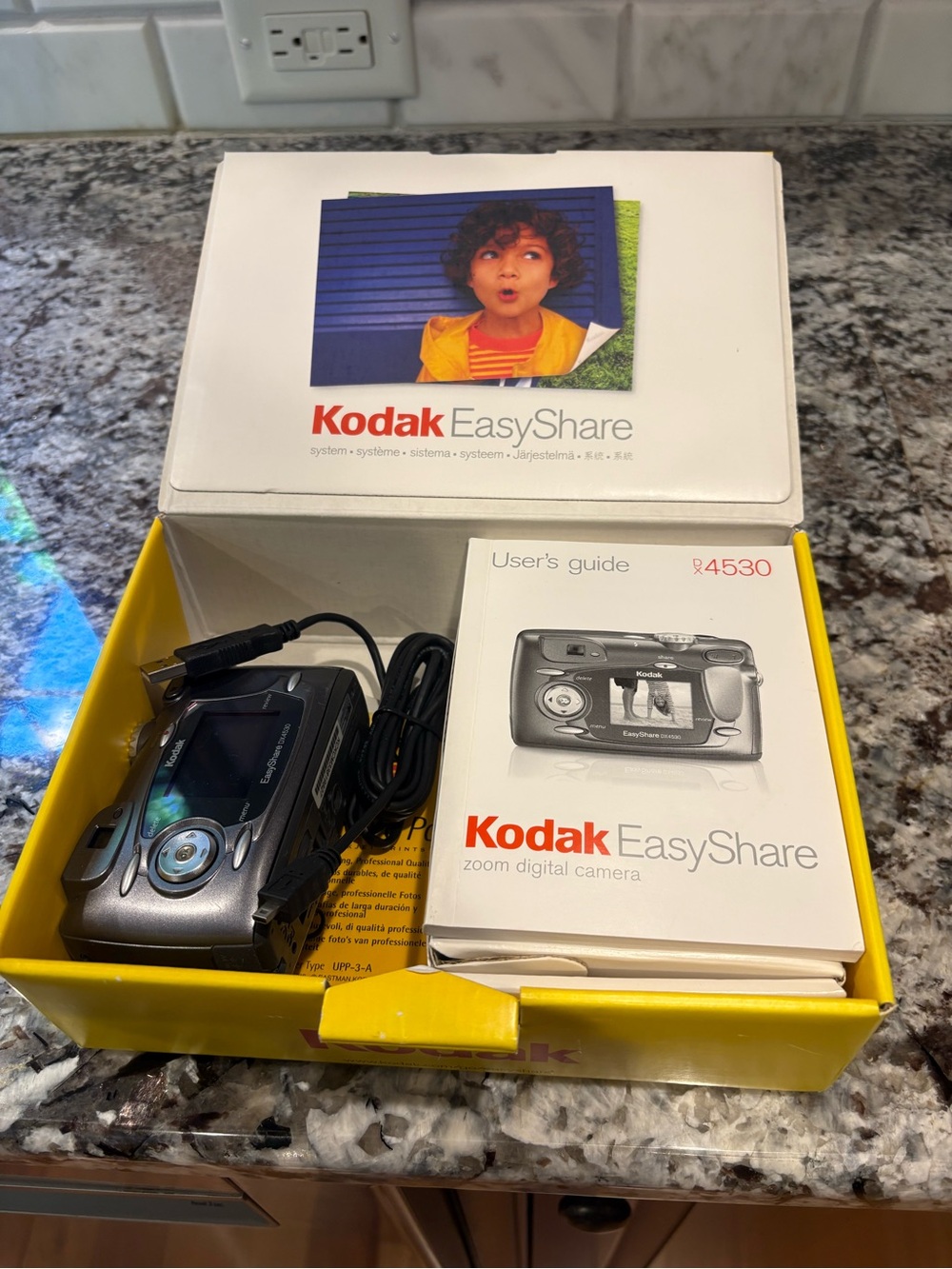 Kodak EasyShare Digital Camera in Dark Gray with Yellow Box